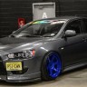 Спойлер переднего бампера (под клыки) для Mitsubishi Lancer X купить недорого с доставкой в Омск